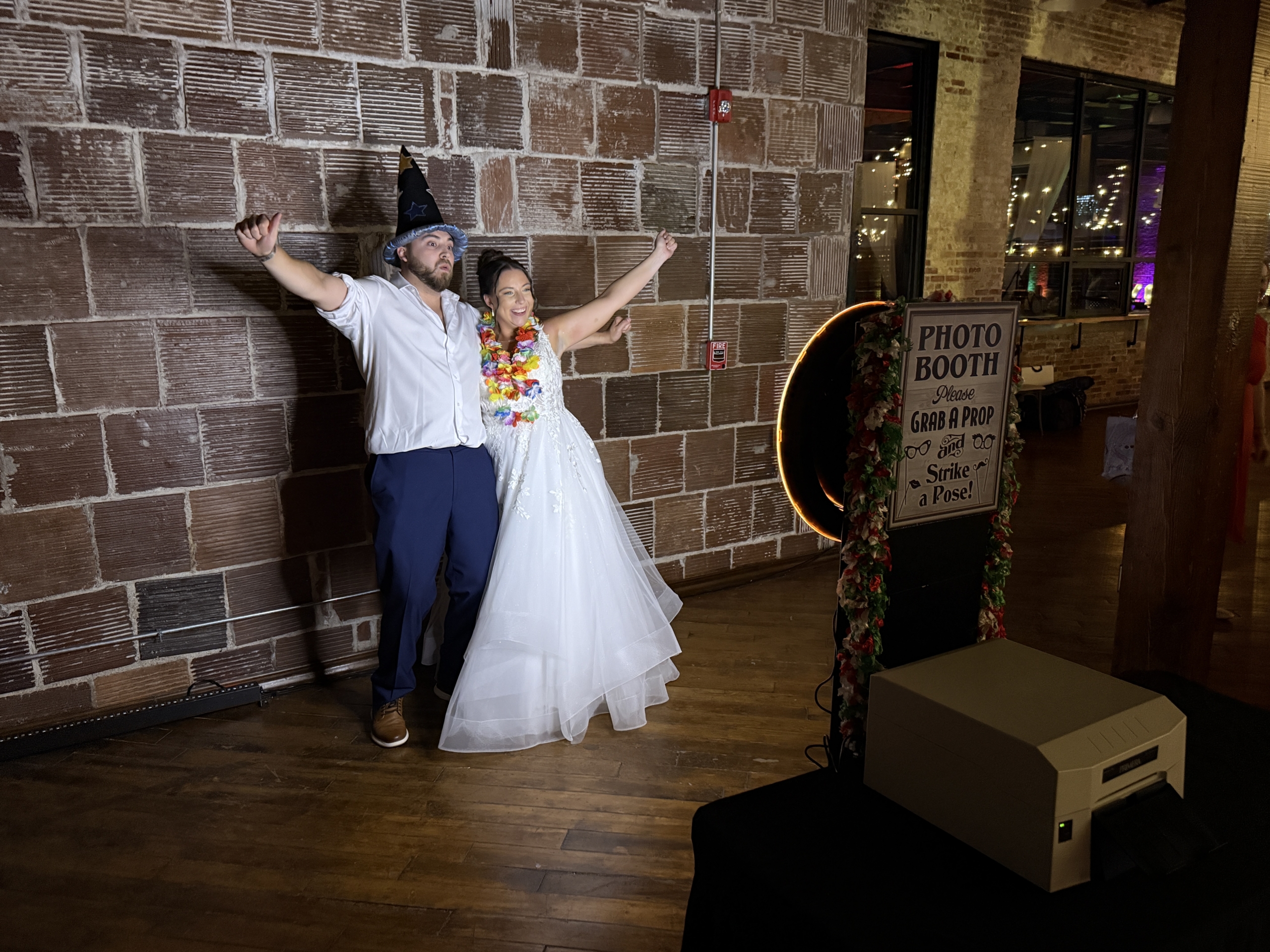 Prall-Mosby Bride and Groom at Photobooth